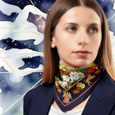 Woman wearing a floral scarf with a zodiac background